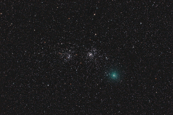 Comet 103P/Hartley 2 and the Double Cluster